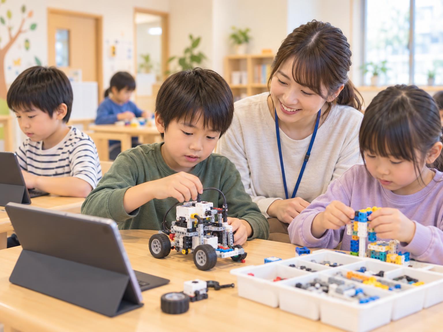 放課後等デイサービスでSTEM教育に取り組む子どもたちと支援員