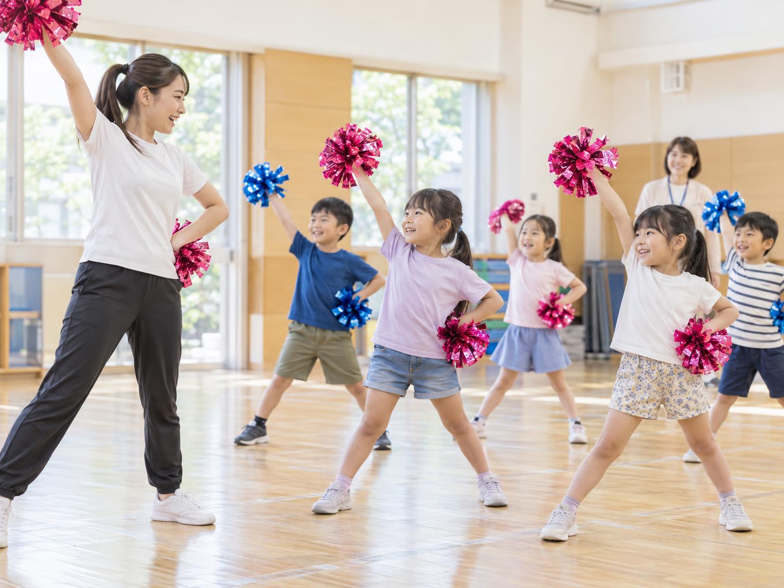 学童施設でチアダンスの外部講師が子どもたちに指導している様子
